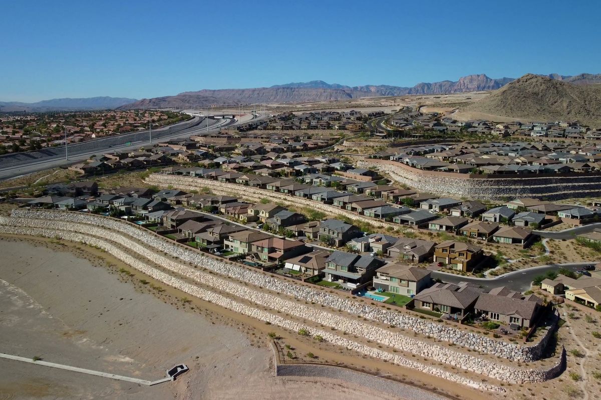 Las Vegas neighborhood from above with desert mountains behind